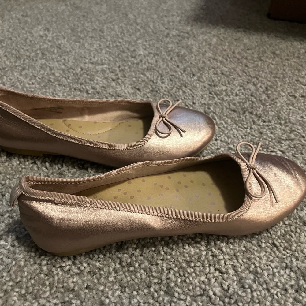 Girl’s rose gold slip on shoes